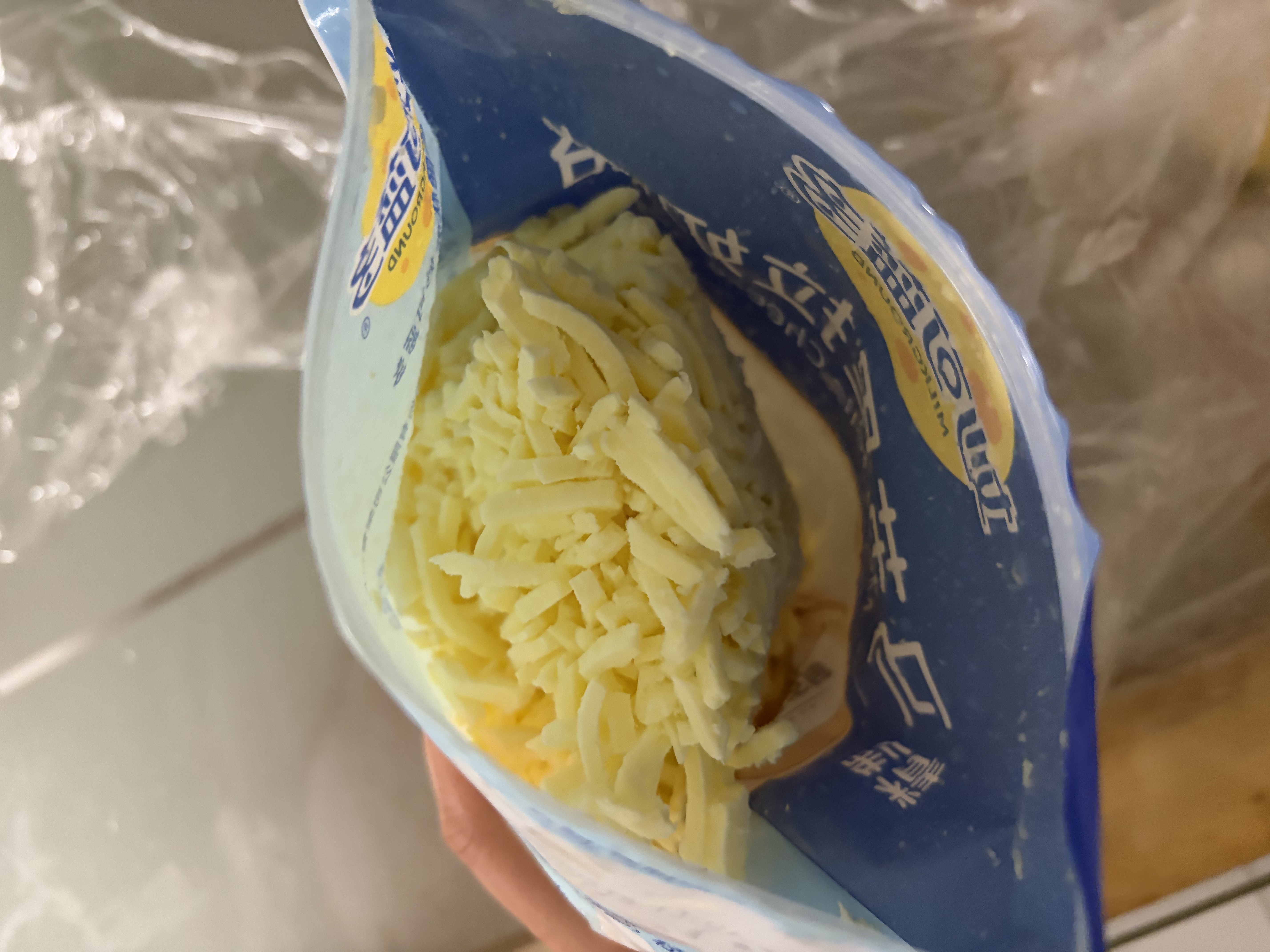 妙可蓝多 马苏里拉芝士碎450g*3 奶酪碎 三明治焗饭披萨烘焙原料 实拍图