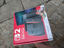 任天堂（Nintendo）【国内保税仓】Switch2/1代 OLED/续航加强日版/港版便携家用ns体感游戏机掌机 新加坡版switch2赛车同捆+塞尔达荒野之息 实拍图
