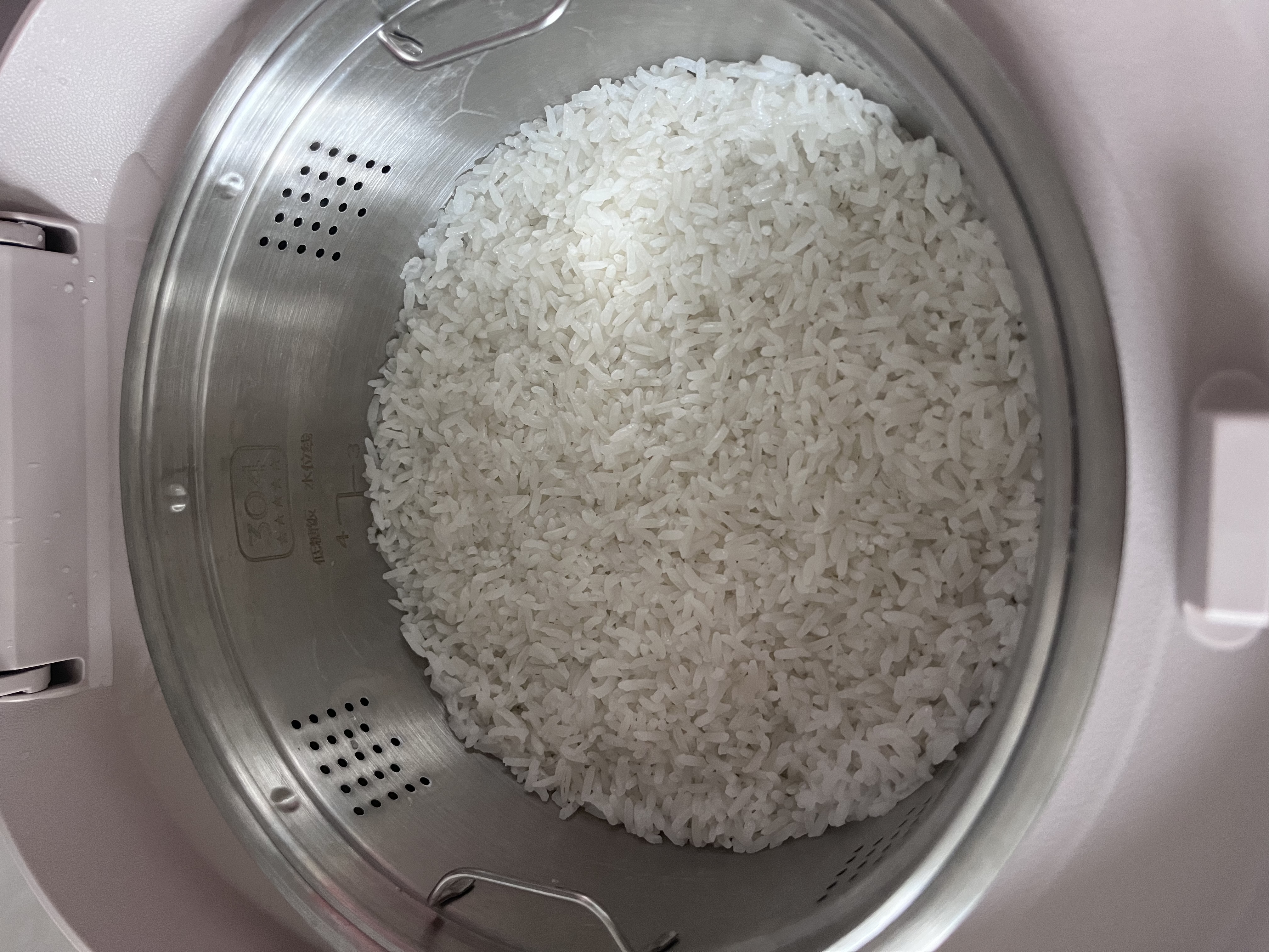 美的（Midea）低糖电饭煲 4升0涂层电饭锅家用智能米汤分离沥米饭煲316L不锈钢3-8人多功能微压蒸柴火饭锅4E62LS 实拍图