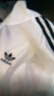 adidas复古风休闲梭织立领夹克外套男女秋季阿迪达斯官方三叶草   亮白   M 实拍图