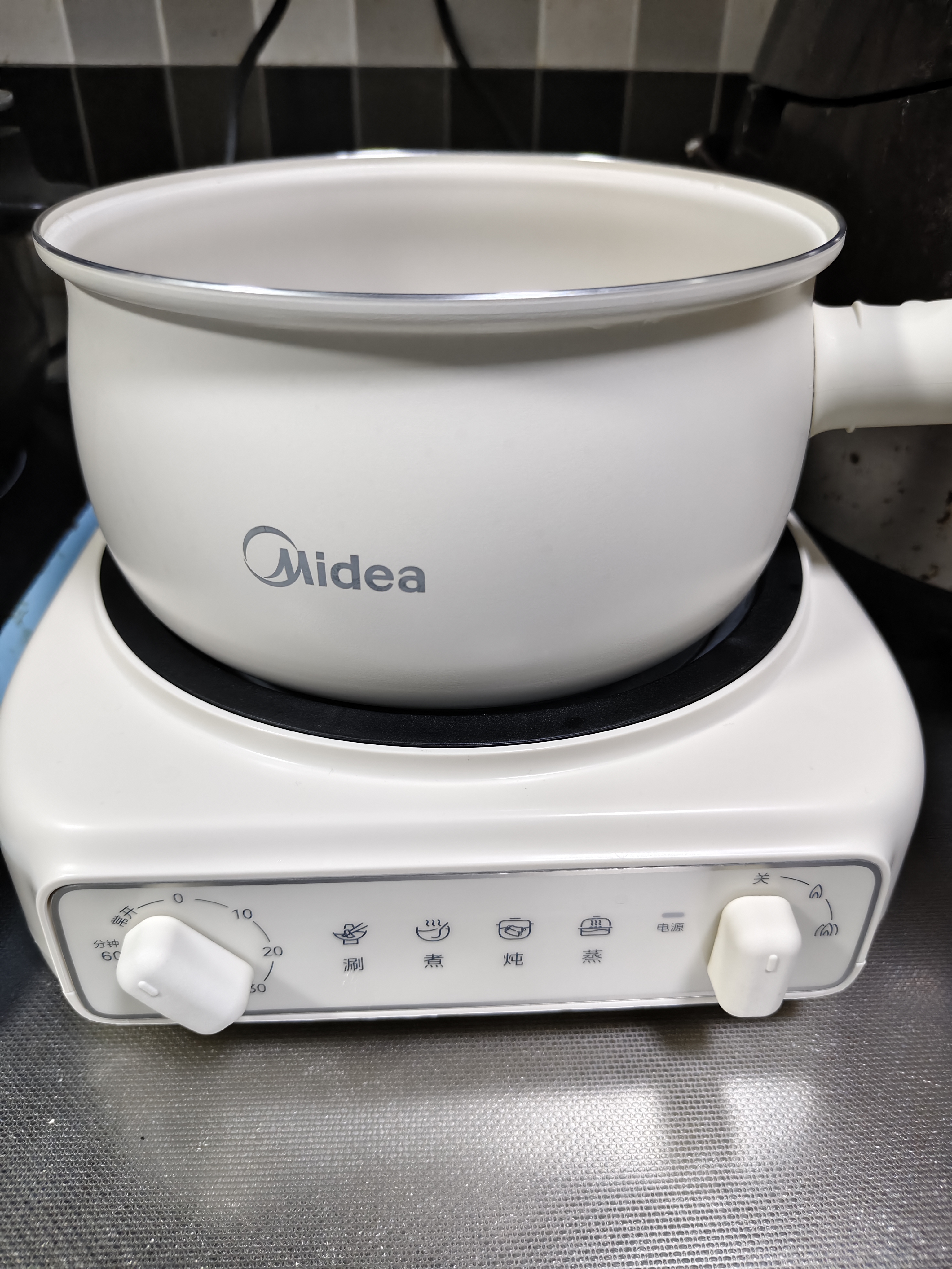 美的（Midea）电煮锅 小电锅 电蒸锅 电火锅 电热锅 分体式可拆洗 2.6L学生宿舍多功能锅 泡面锅 XZC2061 配蒸笼 实拍图