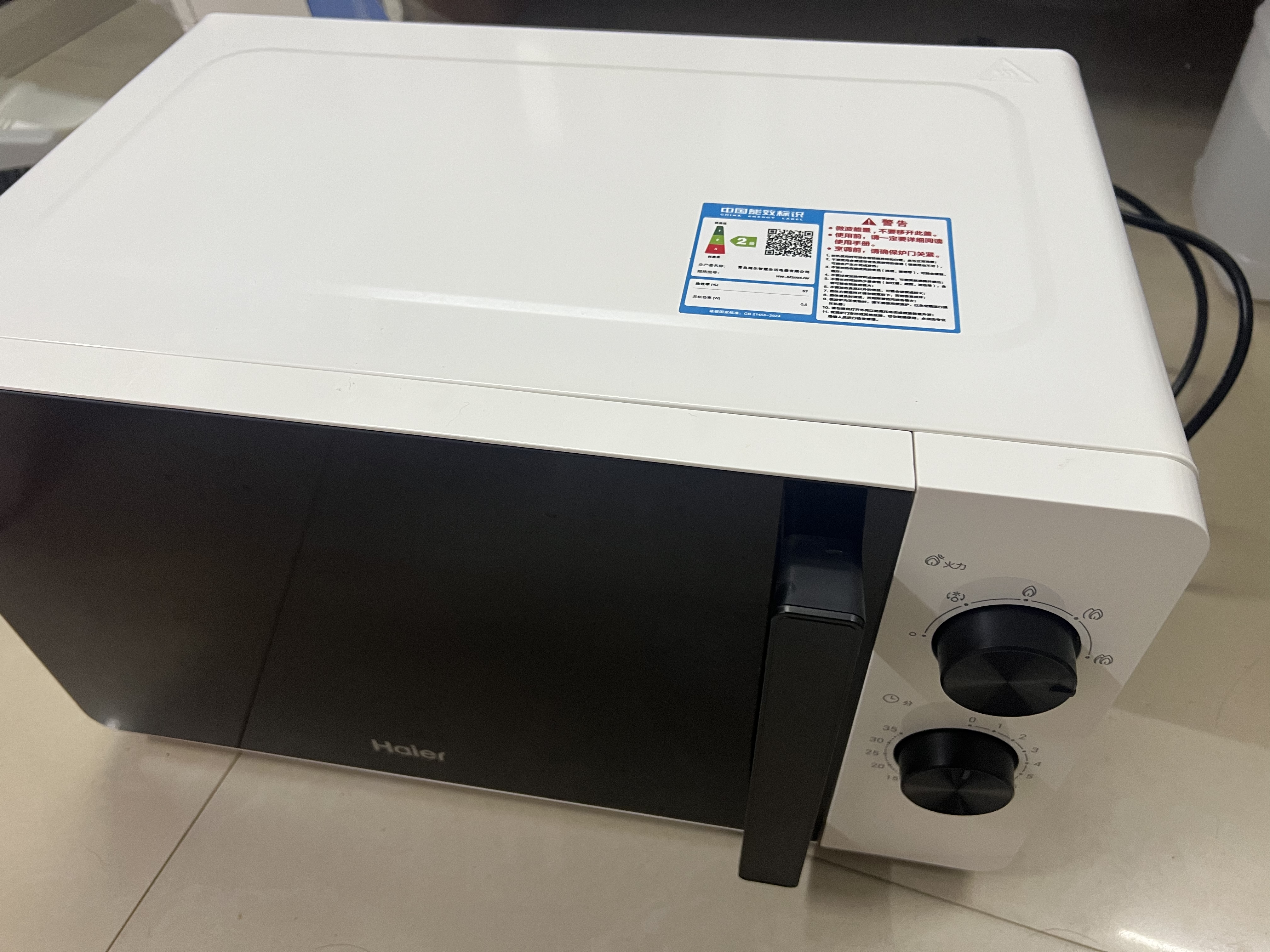 海尔（Haier）0涂层不锈钢快捷微波炉 360°转盘加热 旋转操作易洁内胆 家用小型 老人适用 HW-M2003JW 厨房电器 实拍图
