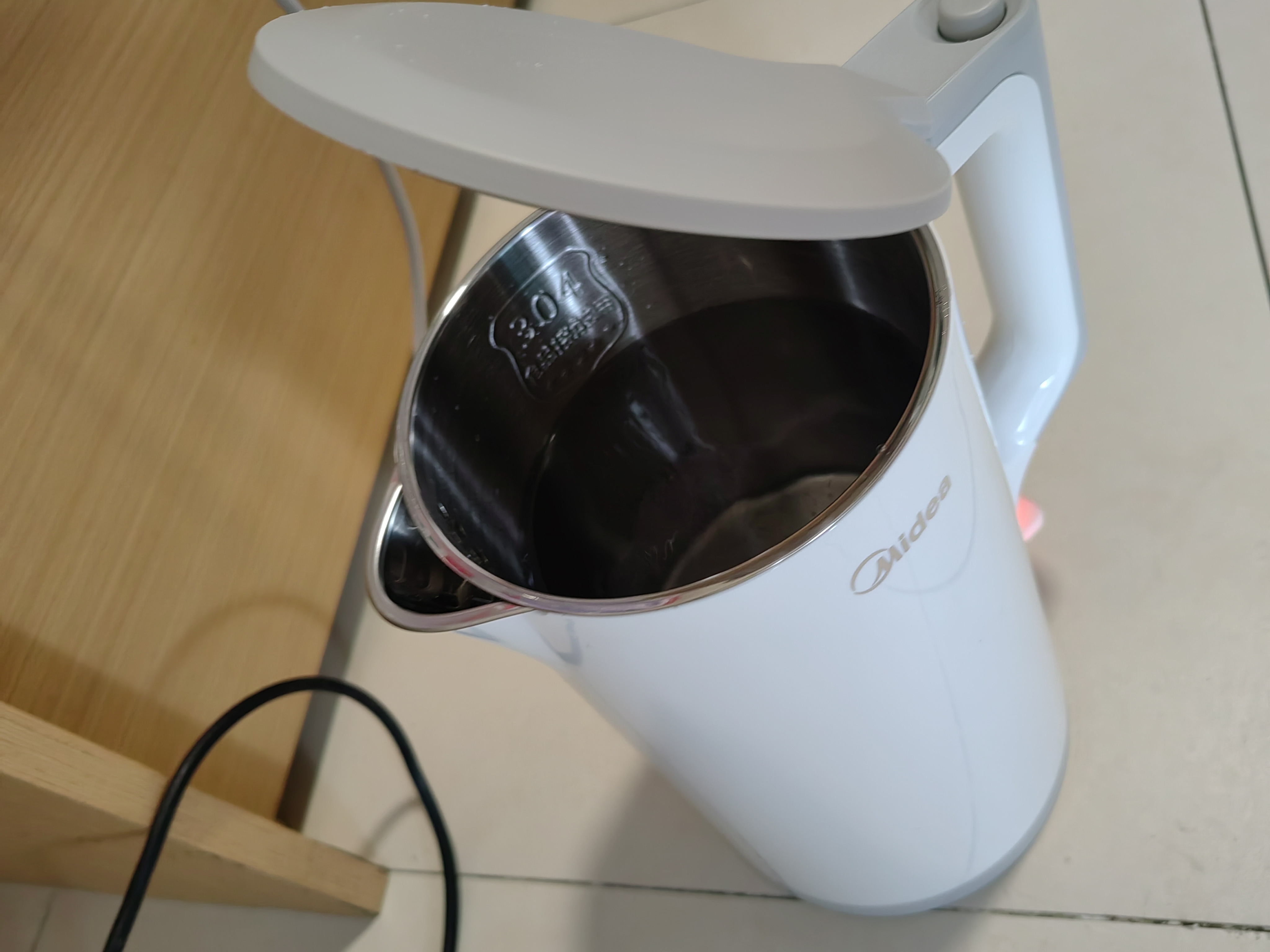 美的（Midea）烧水壶电热水壶304食品级不锈钢无缝内胆双层防烫1.7L大容量1800W智能断电SHJ1721 实拍图