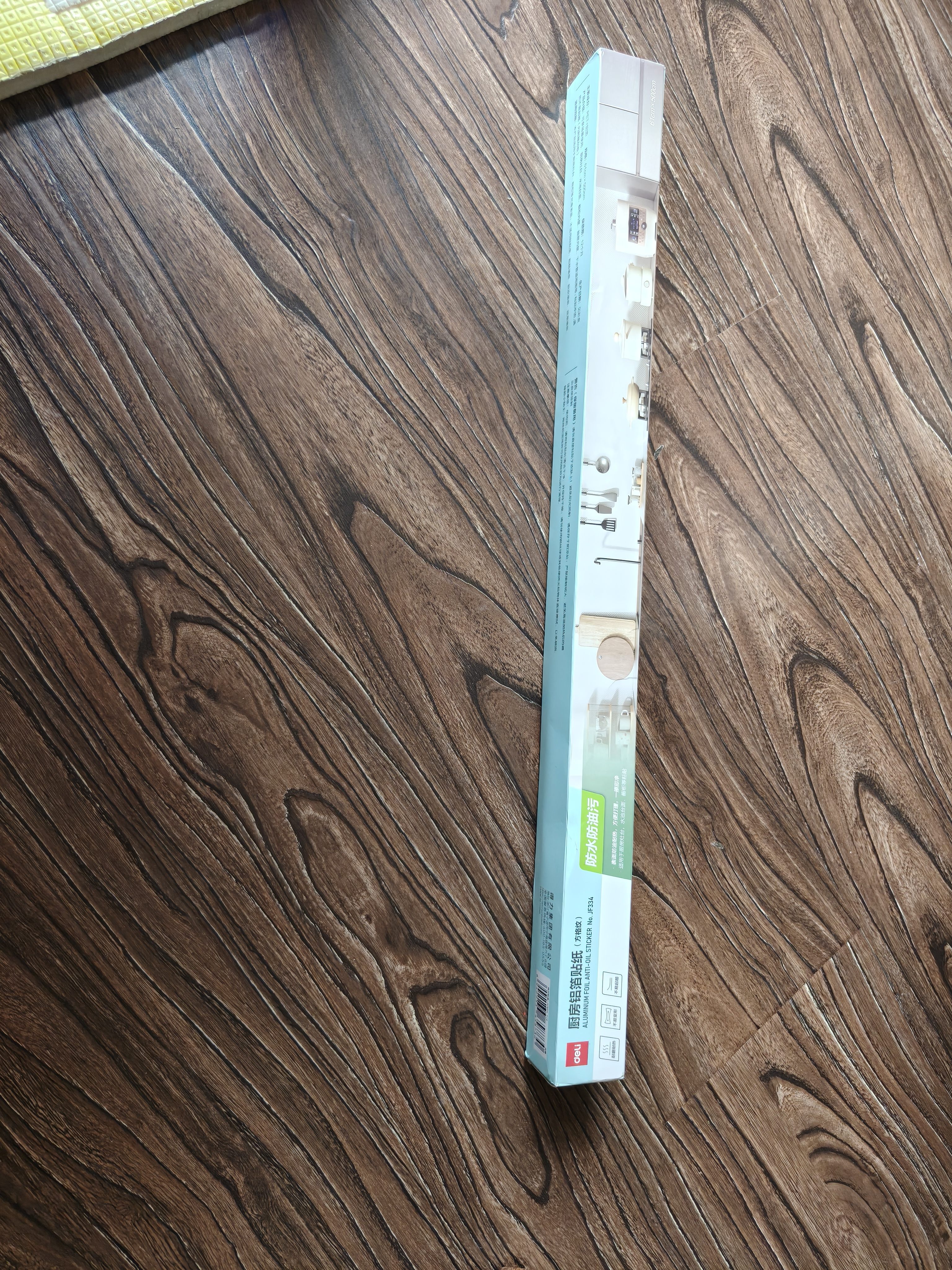 得力（deli）厨房铝箔贴纸 防水耐高温 自粘墙贴 灶台保护膜 防油贴 61cm*5m 方格纹 JF334 实拍图