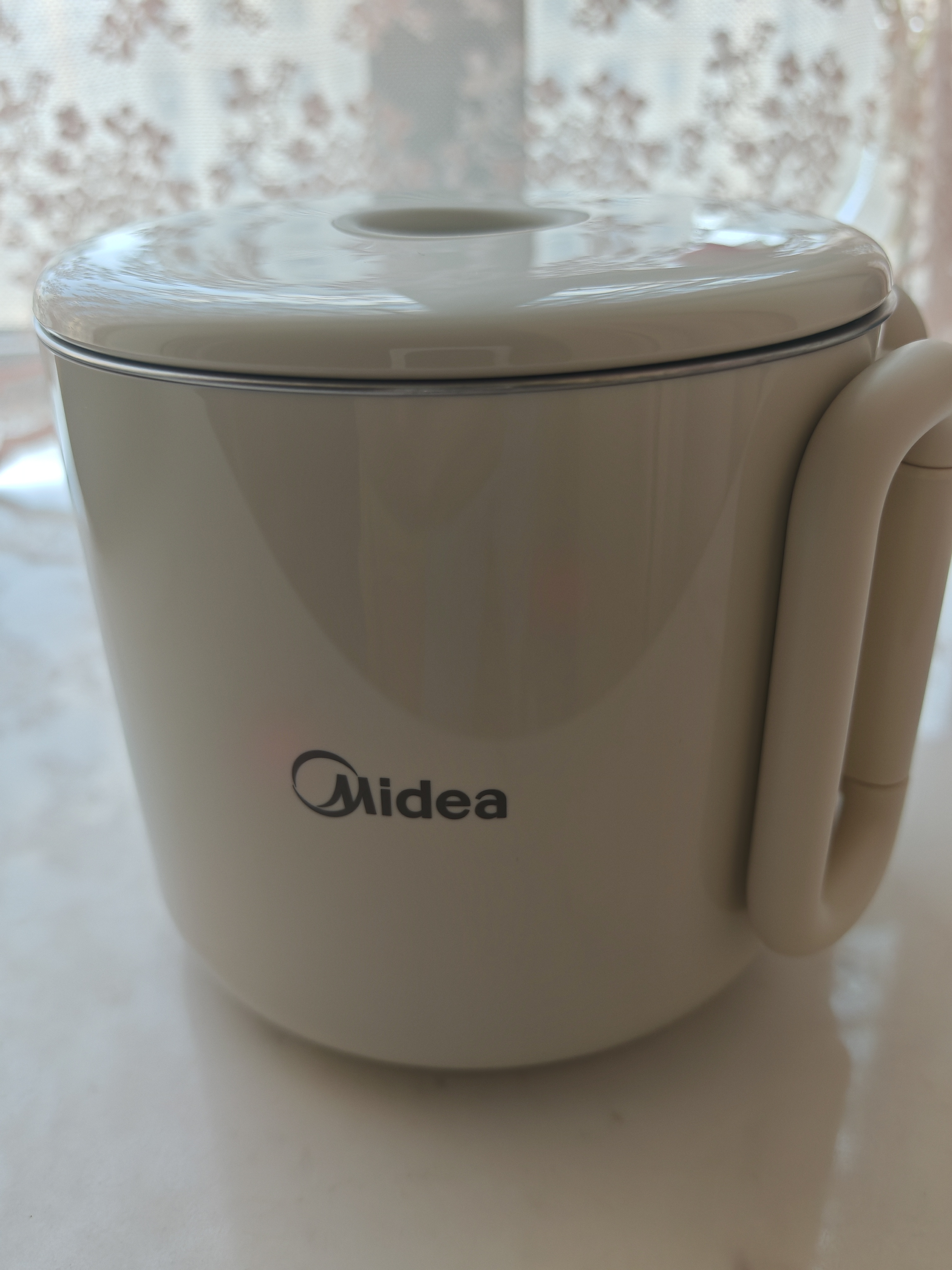 美的（Midea）便携电热水壶折叠0.7L容量差旅母婴级316L不锈钢自动断电蒸饮煮泡面杯MK-SH07S104-PRO 实拍图