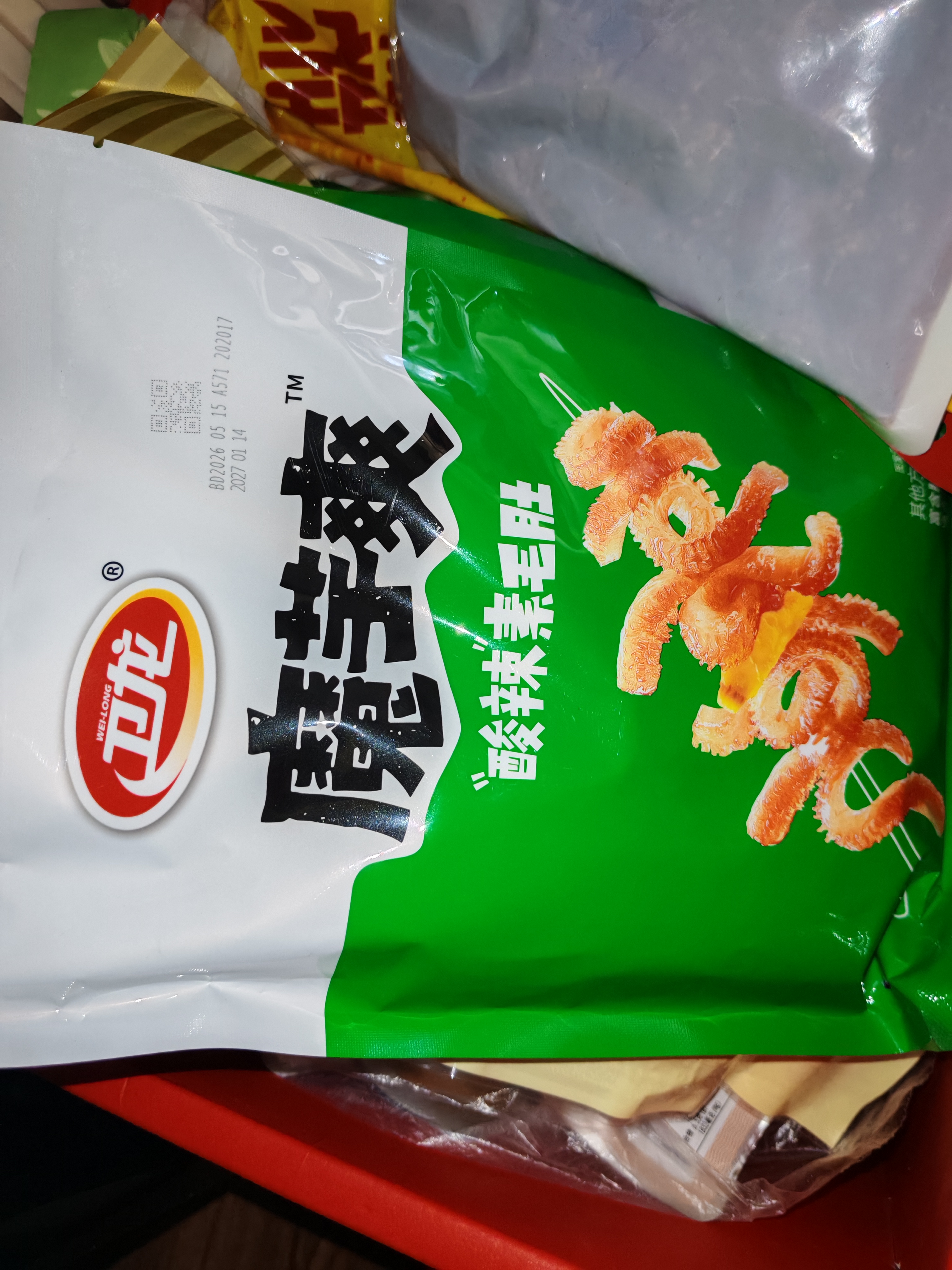 卫龙魔芋爽 辣条 酸辣味素毛肚 180g/袋 休闲小零食 约18小包 实拍图