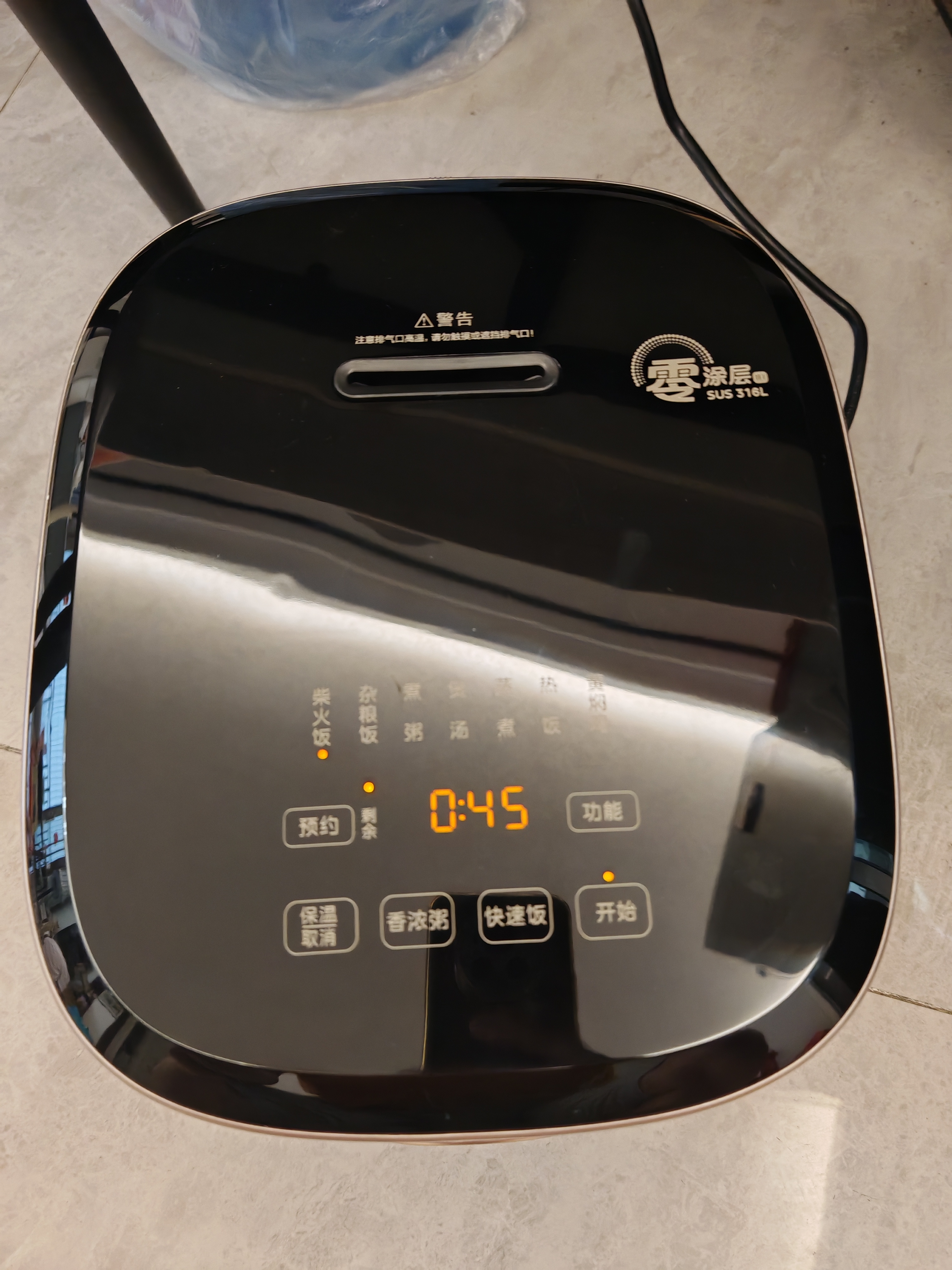 美的（Midea）【政府补贴】电饭煲0涂层家用5L大容量IH无涂层电饭煲316L不锈钢智能5-8人煲汤煮饭锅MB-HC559S 实拍图