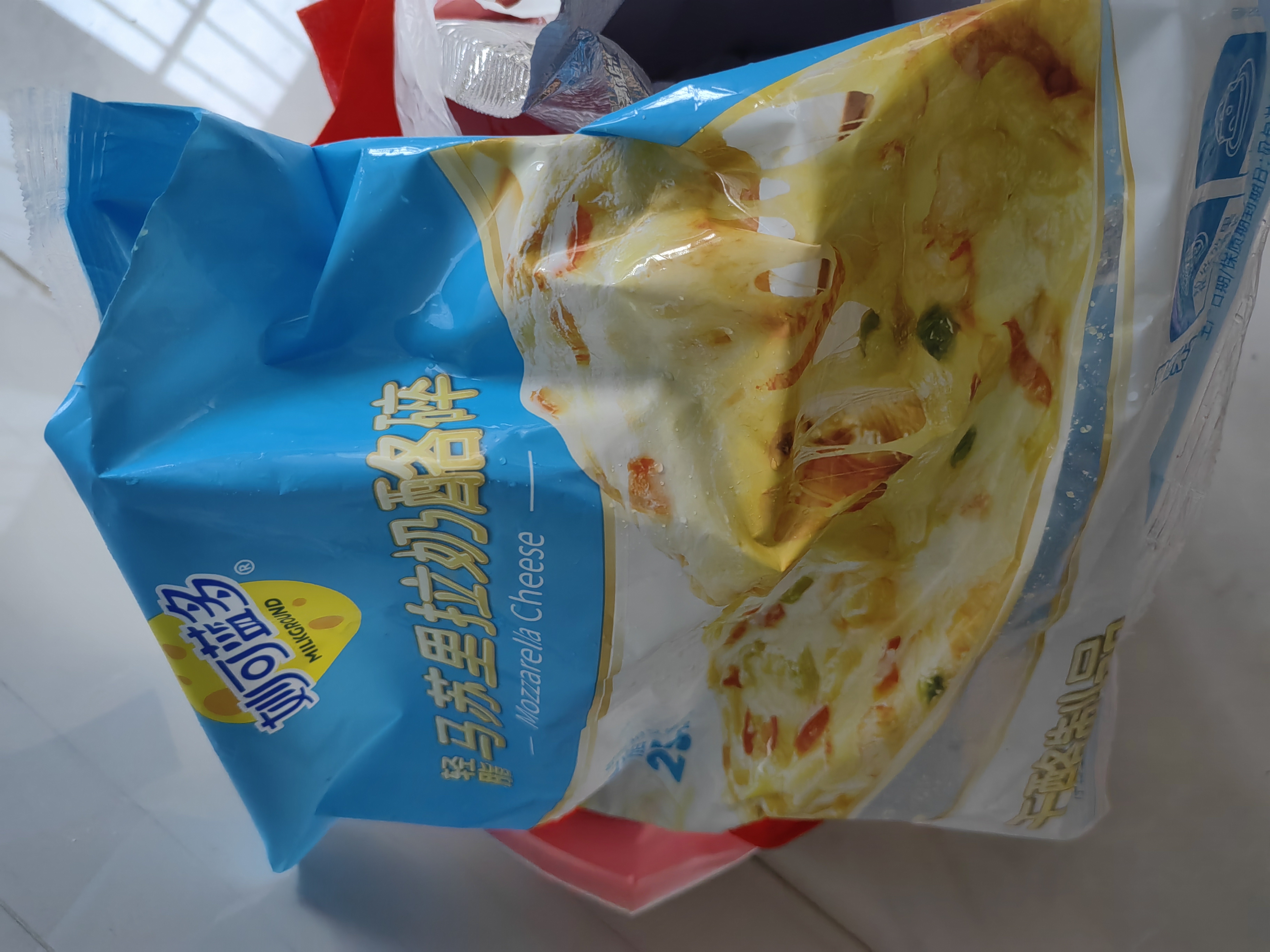 妙可蓝多轻脂马苏里拉芝士碎1kg冷冻锁鲜披萨焗饭家庭烘焙 实拍图