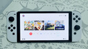 任天堂（Nintendo）【国内保税仓】Switch2/1代 OLED/续航加强日版/港版便携家用ns体感游戏机掌机 日版OLED白色+双人成行+Pro黑色手柄 实拍图