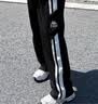 卡帕（Kappa）背靠背运动裤女士2026新款休闲条纹阔腿针织直筒裤子男K0F32AK05D 黑色-990 春夏款 L 实拍图