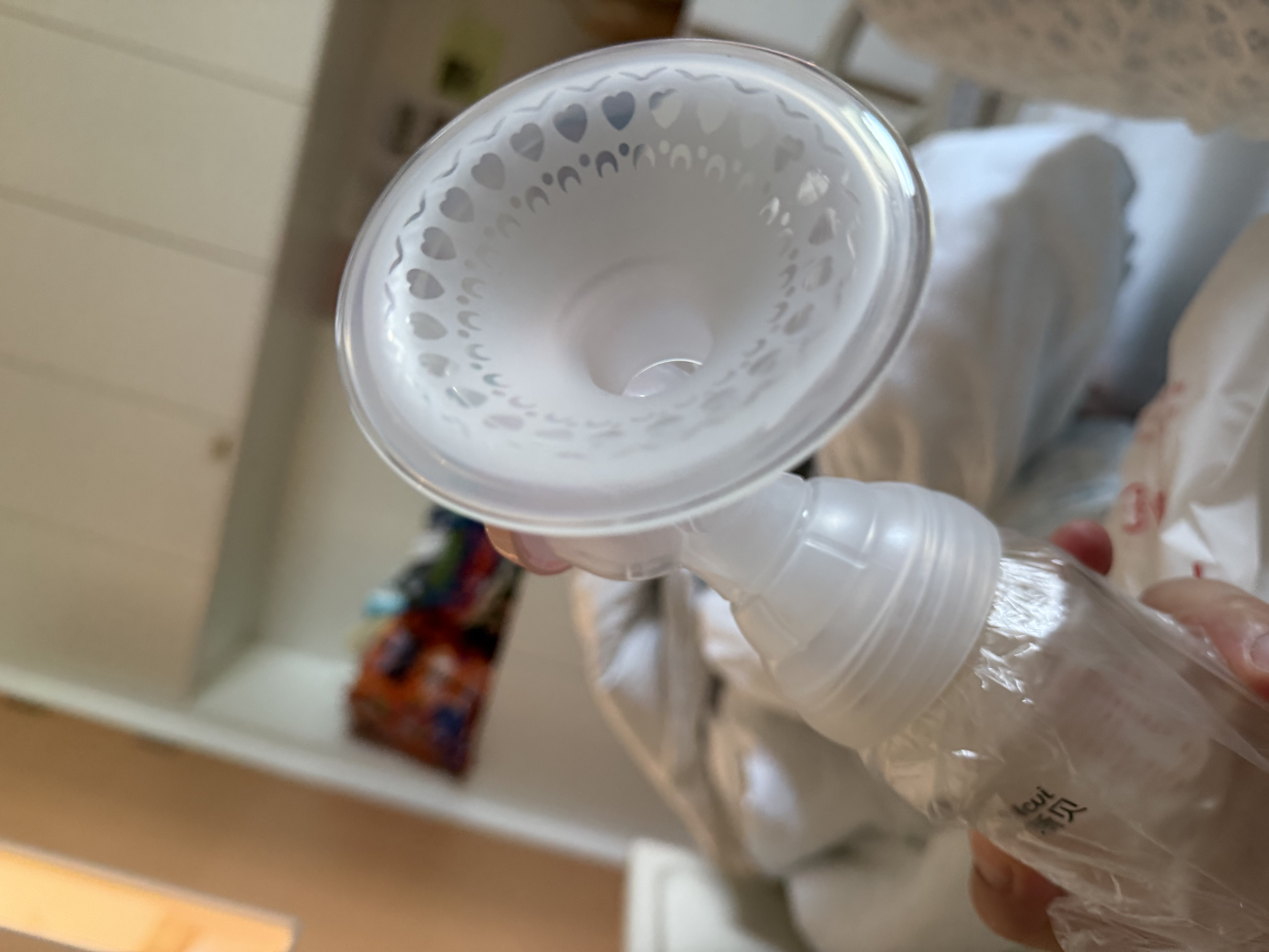新贝吸奶器 电动吸奶器无痛全自动  拔奶器 大吸力便携吸乳器8776 实拍图
