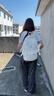 viney书包小学生初中高中大学生背包女大容量旅行双背包户外出游旅行包 白色+可爱挂件 简约轻便高颜值休闲减负电脑包 实拍图
