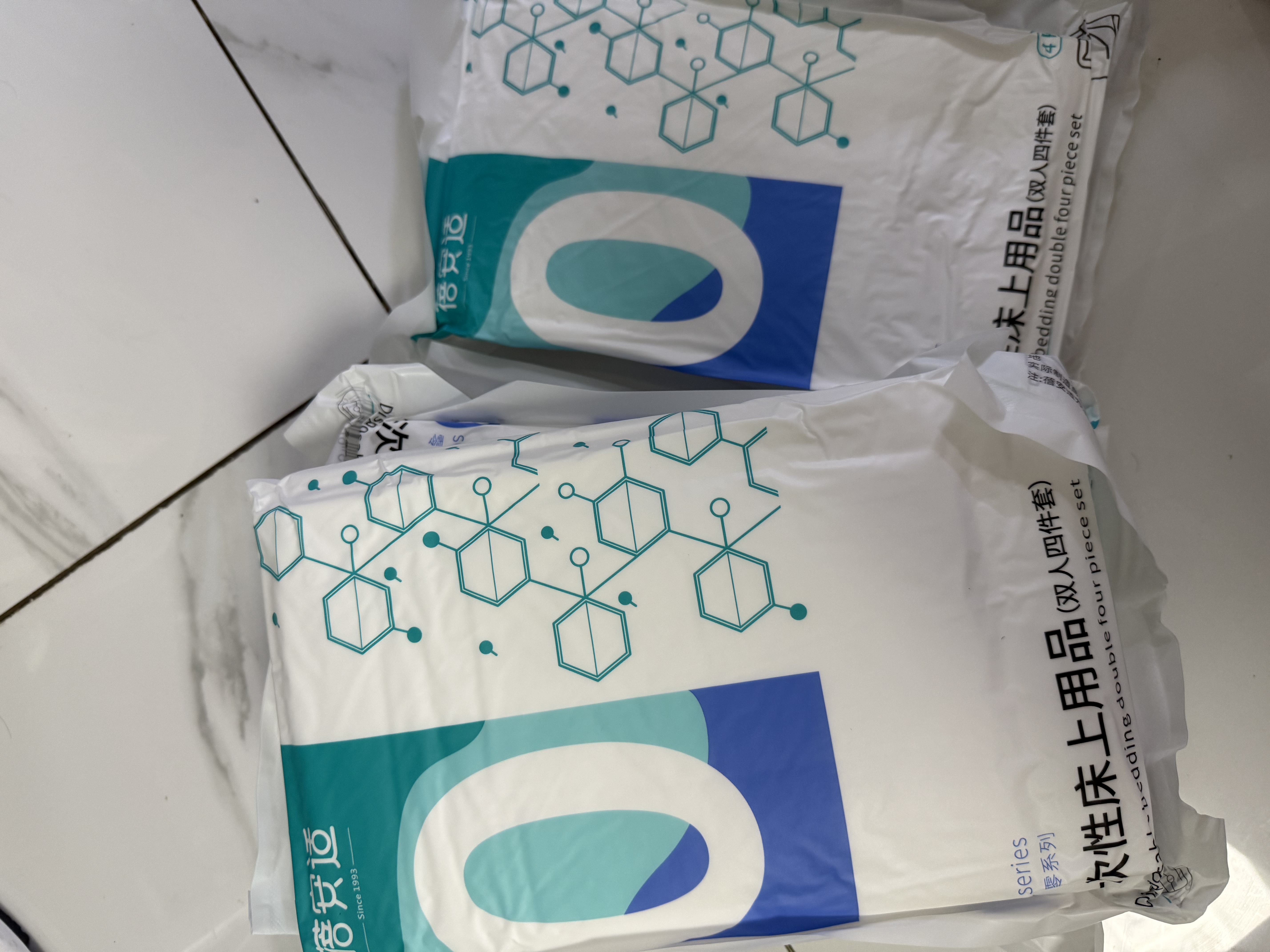 蓓安适一次性四件套酒店隔脏双人加大加厚大床房床上用品套装5包装 实拍图
