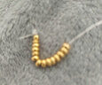 御邪足金999光面算盘珠隔断珠黄金垫片DIY手串手链金配饰 算盘珠:约0.03g 实拍图