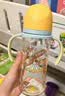 贝亲（Pigeon）防胀气 自然成长翻盖直饮吸管 大童奶瓶330ml 马戏团 18月+ AA279 实拍图