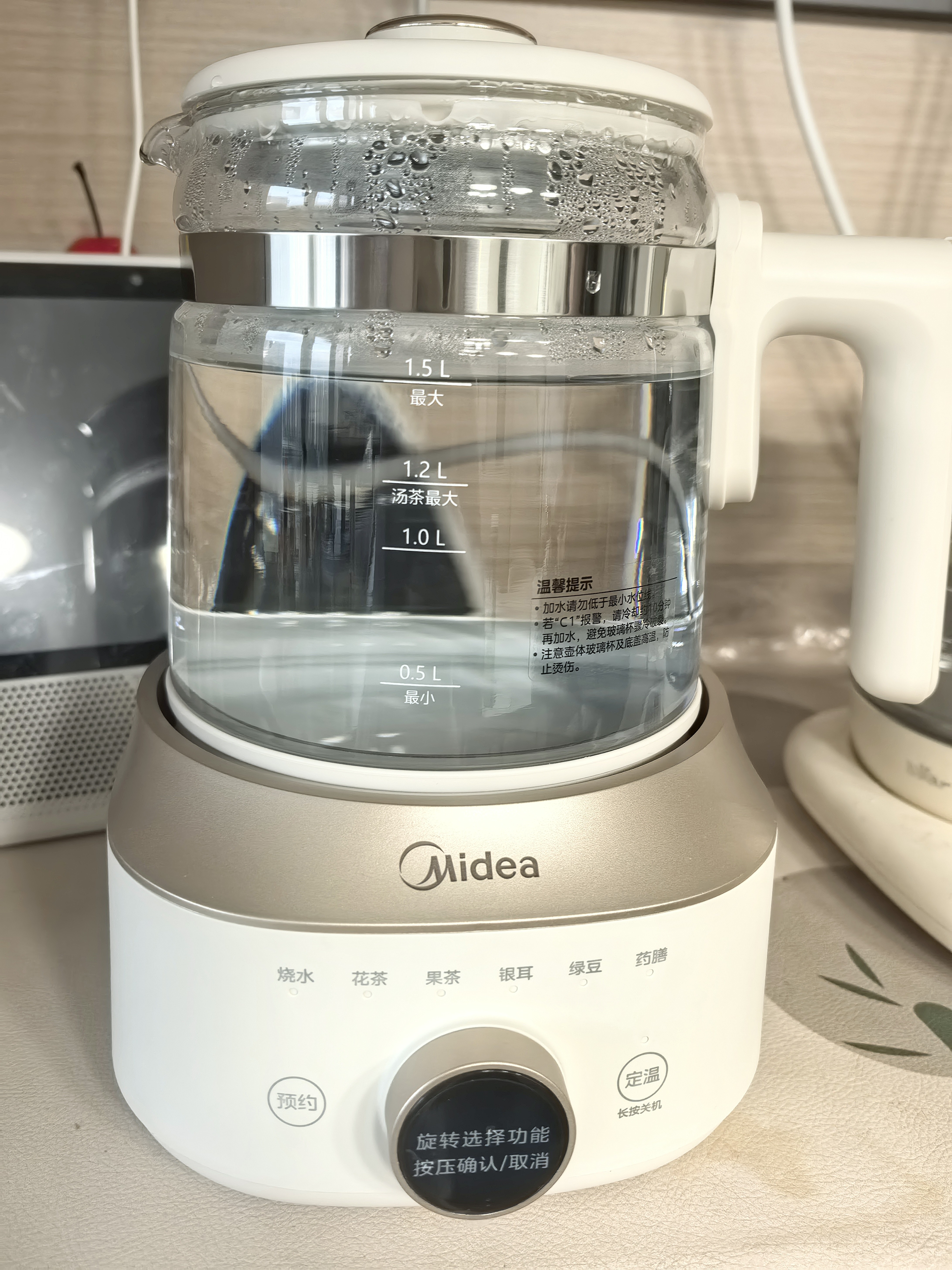 美的（Midea）全玻璃养生壶全自动烧水壶母婴恒温电热水壶花茶壶全包裹护底防碎1.5L MK-YS15B201 实拍图