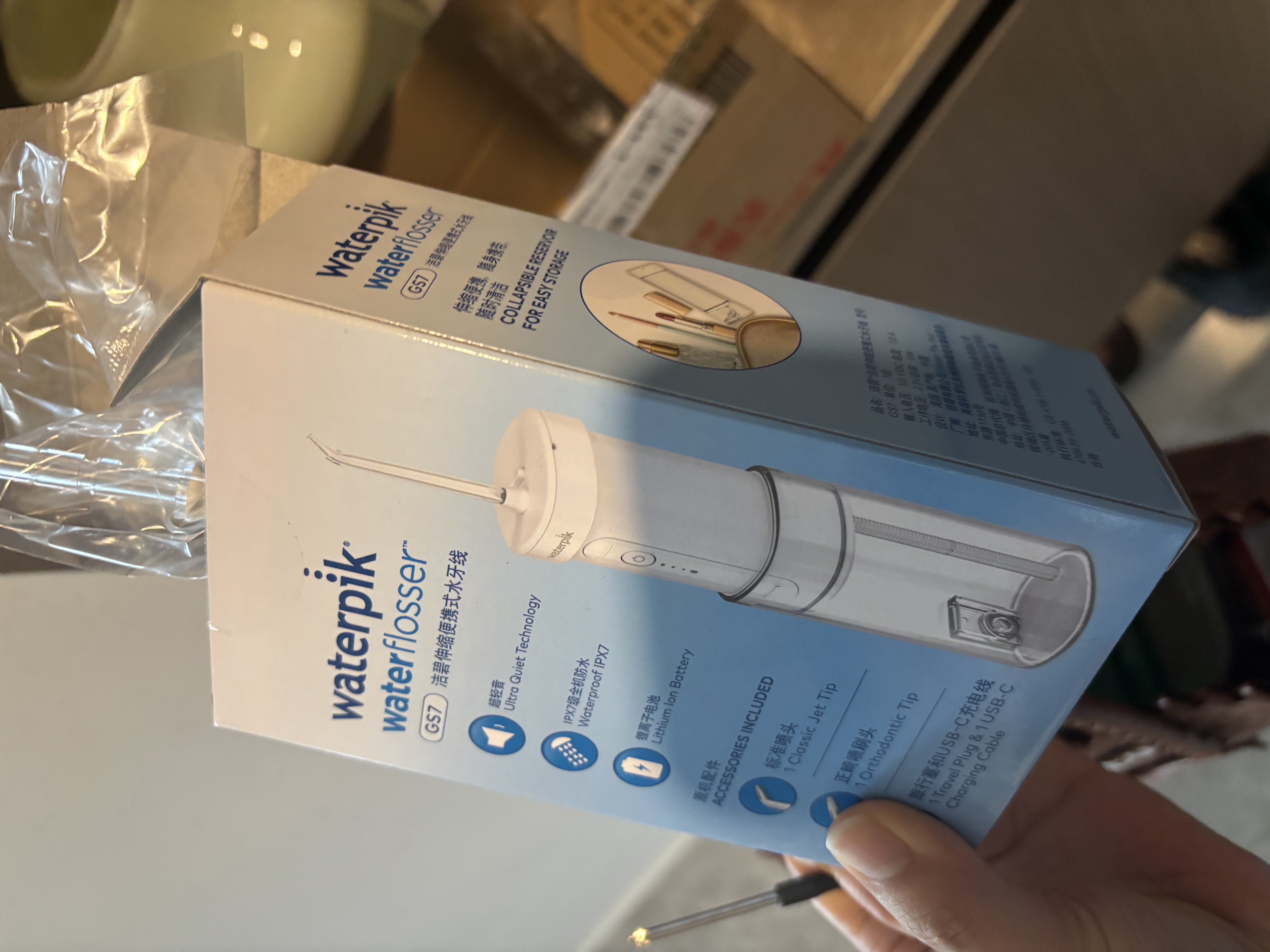 洁碧（Waterpik）冲牙器水牙线GS7-1伸缩便携式电动洁牙机手持式洗牙器家用立式全身水洗 送男女朋友七夕情人节礼物 GS7珍珠白【伸缩便携款】 6支喷头 实拍图