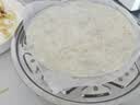 华田禾邦 烫面春饼 1.05kg 30张 无油手抓饼卷饼薄饼烙馍 速食早餐半成品 实拍图