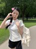 viney书包小学生初中高中大学生背包女大容量旅行双背包户外出游旅行包 白色+可爱挂件 简约轻便高颜值休闲减负电脑包 实拍图