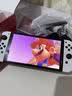 任天堂（Nintendo）【国内保税仓】Switch2/1代 OLED/续航加强日版/港版便携家用ns体感游戏机掌机 港版OLED白色+马里奥奥德赛 实拍图