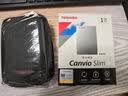 东芝（TOSHIBA） 金属移动硬盘CANVIO SLIM商务高速USB3.2带加密备份功能电脑硬盘 经典标配：硬壳包、硬盘、原装线、说明书（银） 1TB 实拍图