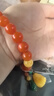欧采妮天然保山南红蜜蜡手串单圈琥珀镶嵌蜜蜡雕刻小脚丫物手链柿子红 实拍图