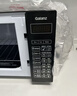 格兰仕（Galanz）微波炉烤箱一体机光波20L家用700W节能平板易清洁智能菜单多功能小型烧烤解冻预约 2026新款 DG 全新机器 实拍图