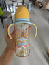 贝亲（Pigeon）防胀气 自然成长翻盖直饮吸管 大童奶瓶330ml 马戏团 18月+ AA279 实拍图