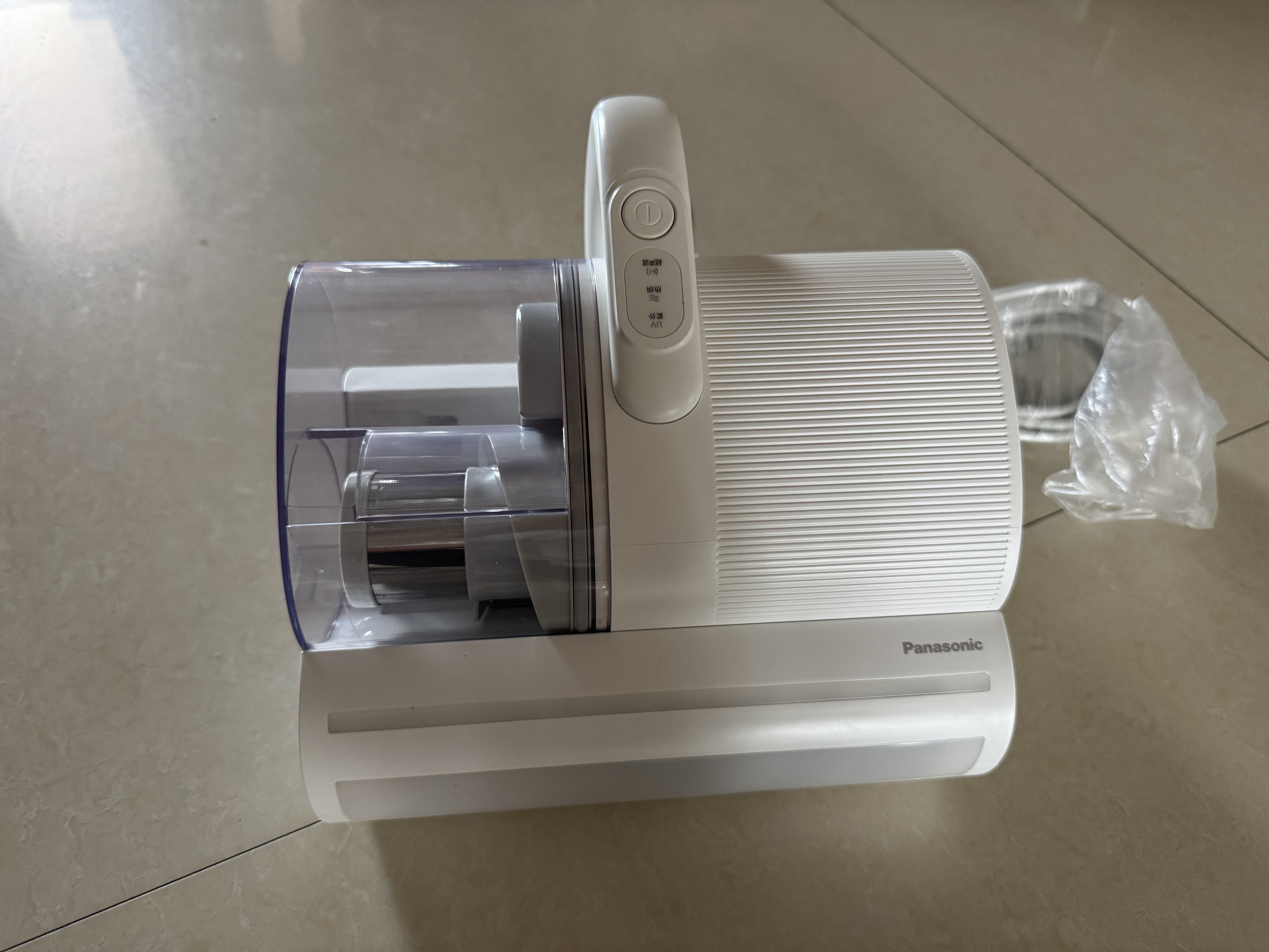 松下（Panasonic）【专业除螨】手持除螨仪床上高温杀菌吸尘器三合一床宝大吸力双尘杯紫外线高温热风除湿烘干DC25W 珍珠白Pro【升级款】DC25W 实拍图