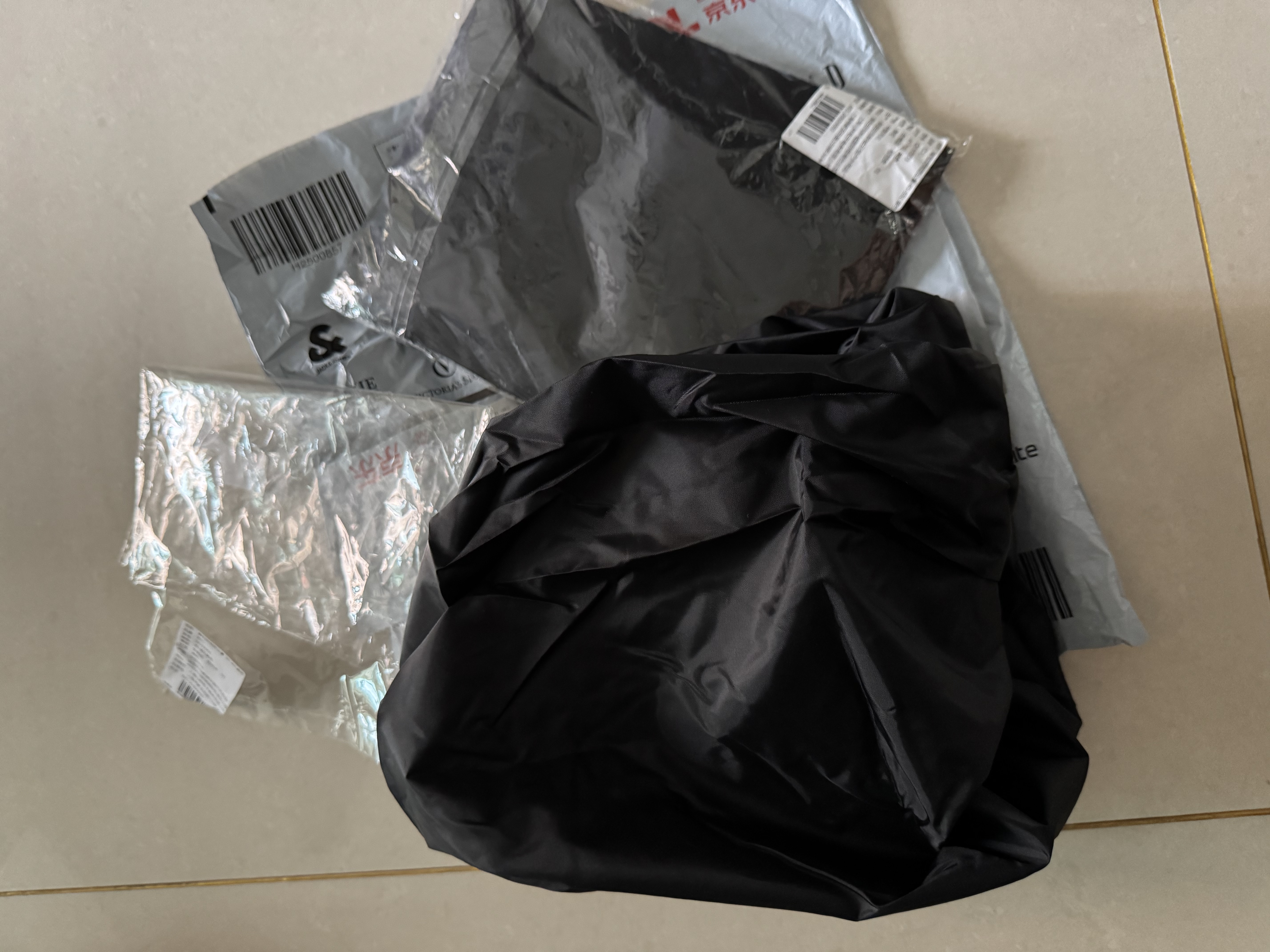 欣沁背包防雨罩户外背包防水套中小学生书包防雨防尘罩 40-55L 黑色 实拍图