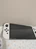 任天堂（Nintendo）【国内保税仓】Switch2/1代 OLED日版/港版游戏机续航加强版ns体感掌机便携家用主机 港版OLED白色64G（赠2年共享会员）保税仓 实拍图