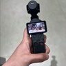 大疆 DJI Osmo Pocket 4 一英寸口袋云台相机 OP灵眸手持数码相机 旅游vlog 便携美颜摄像 标准套装 实拍图