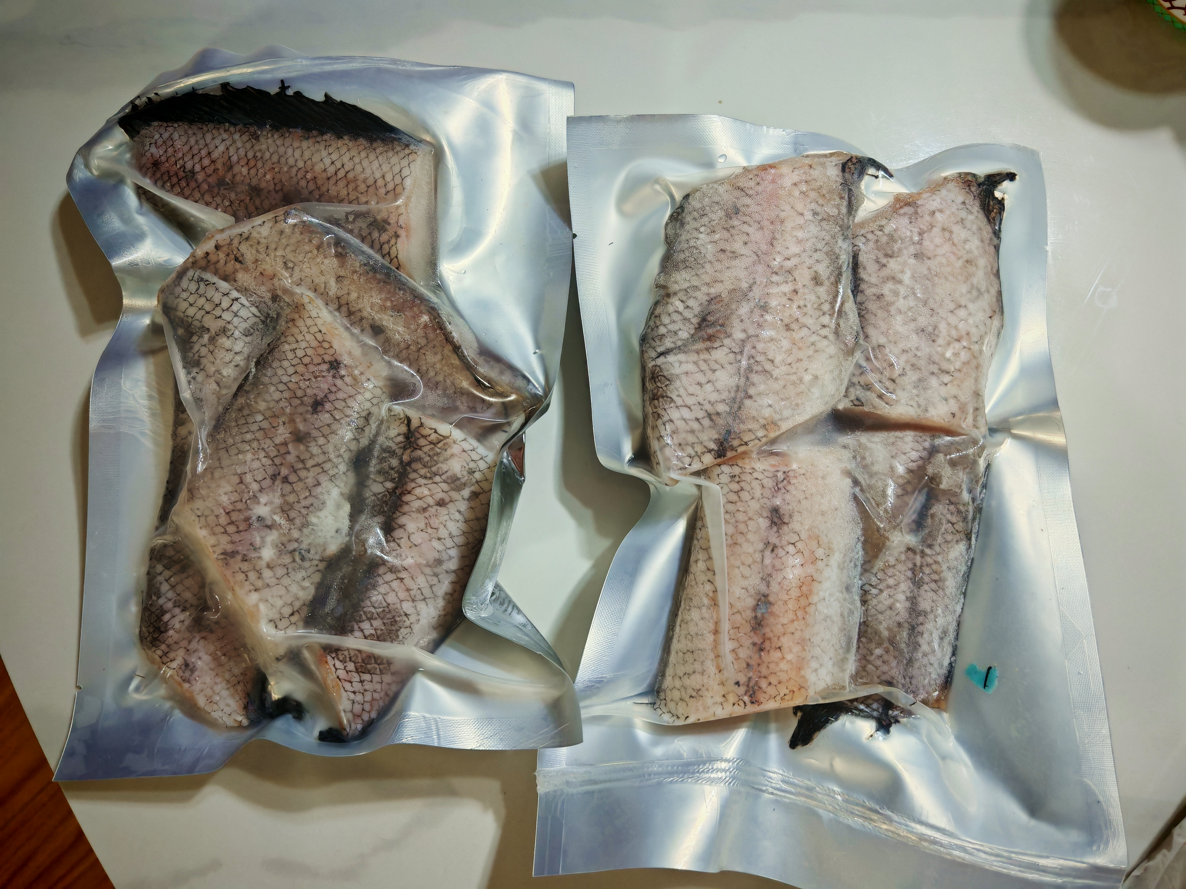 俄罗斯进口深海鳕鱼鳕鱼尾 新鲜原切真空包装低温锁鲜儿童营养餐 俄罗斯进口鳕鱼鳕鱼尾 简装 1000g 五百克一包2包装 实拍图