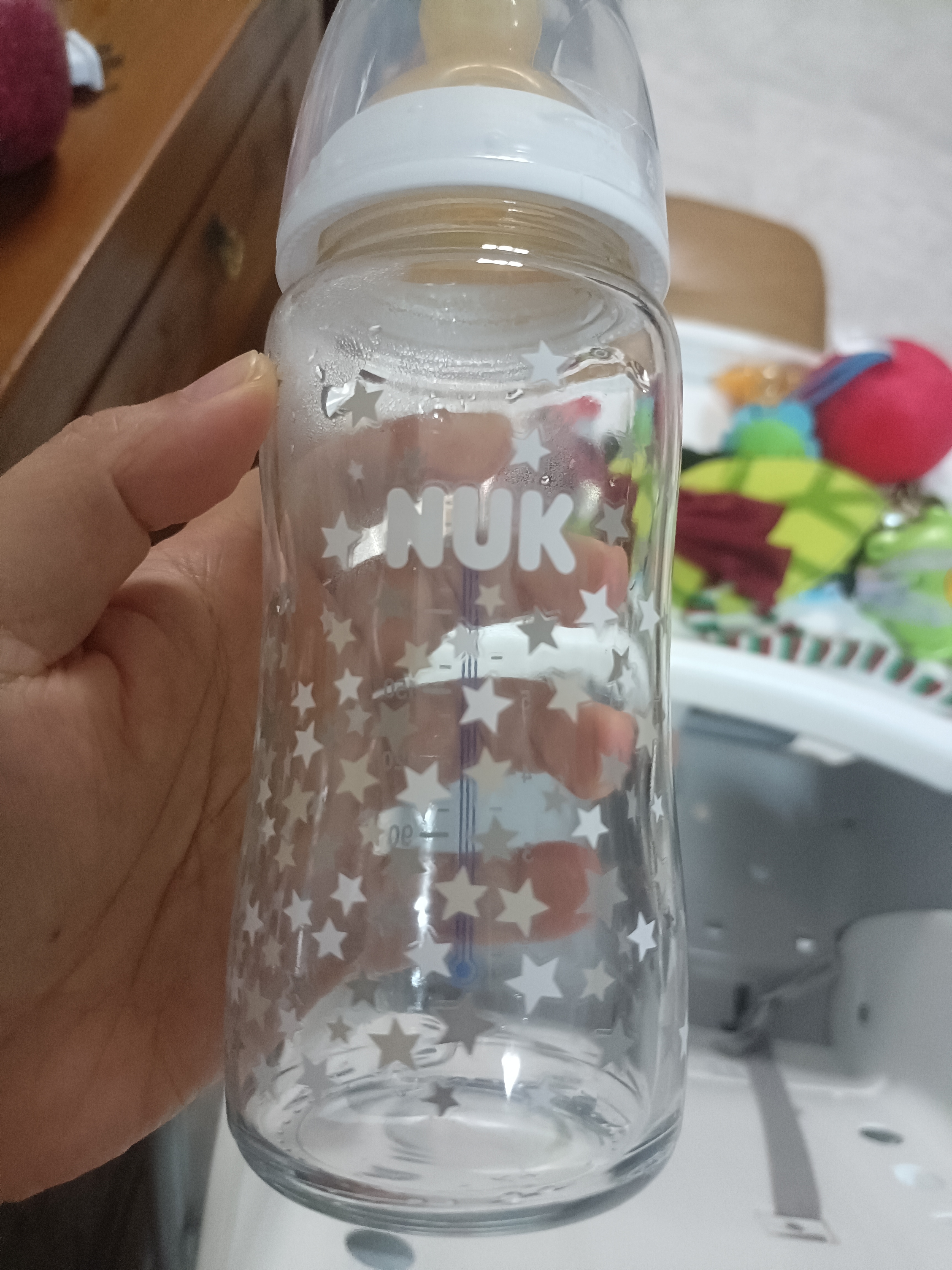 NUK德国宽口径宝宝白色款带0-6个月M号硅胶奶嘴防胀气240ml玻璃奶瓶 实拍图