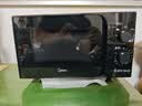 美的（Midea）微波炉经典升级款M2A 家用小型20升平板式易清洁快捷双旋钮高效速热杀菌除味2026新款 实拍图