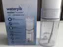洁碧（Waterpik）冲牙器水牙线GS7-1伸缩便携式电动洁牙机手持式洗牙器家用立式全身水洗 送男女朋友七夕情人节礼物 GS7珍珠白【伸缩便携款】 6支喷头 实拍图