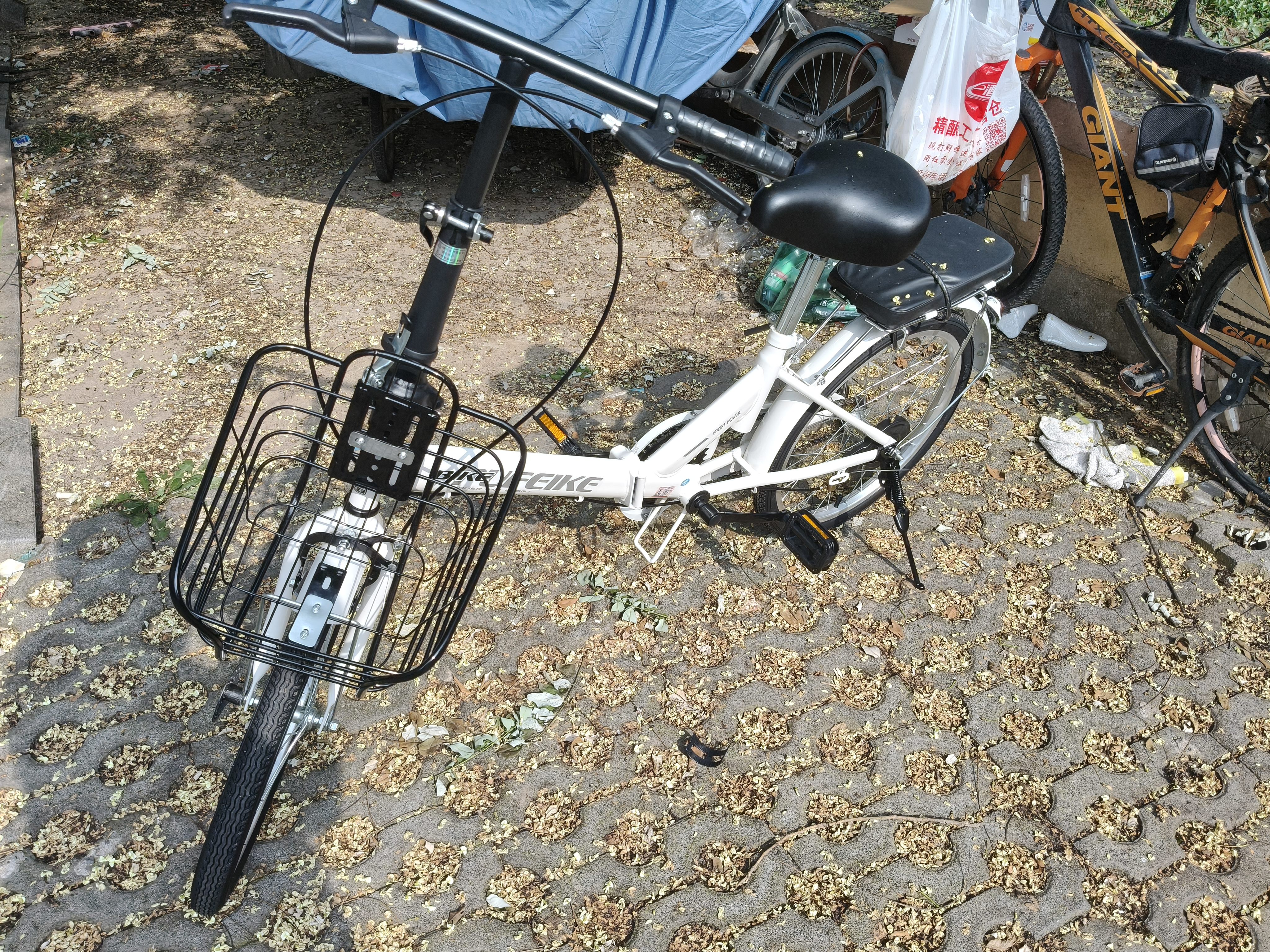 普菲克PUFEIK折叠自行车成人轻便变速男女式充气实心胎学生城市上班通勤 白色/单速/无减震/钢车圈/20寸 20寸 实拍图