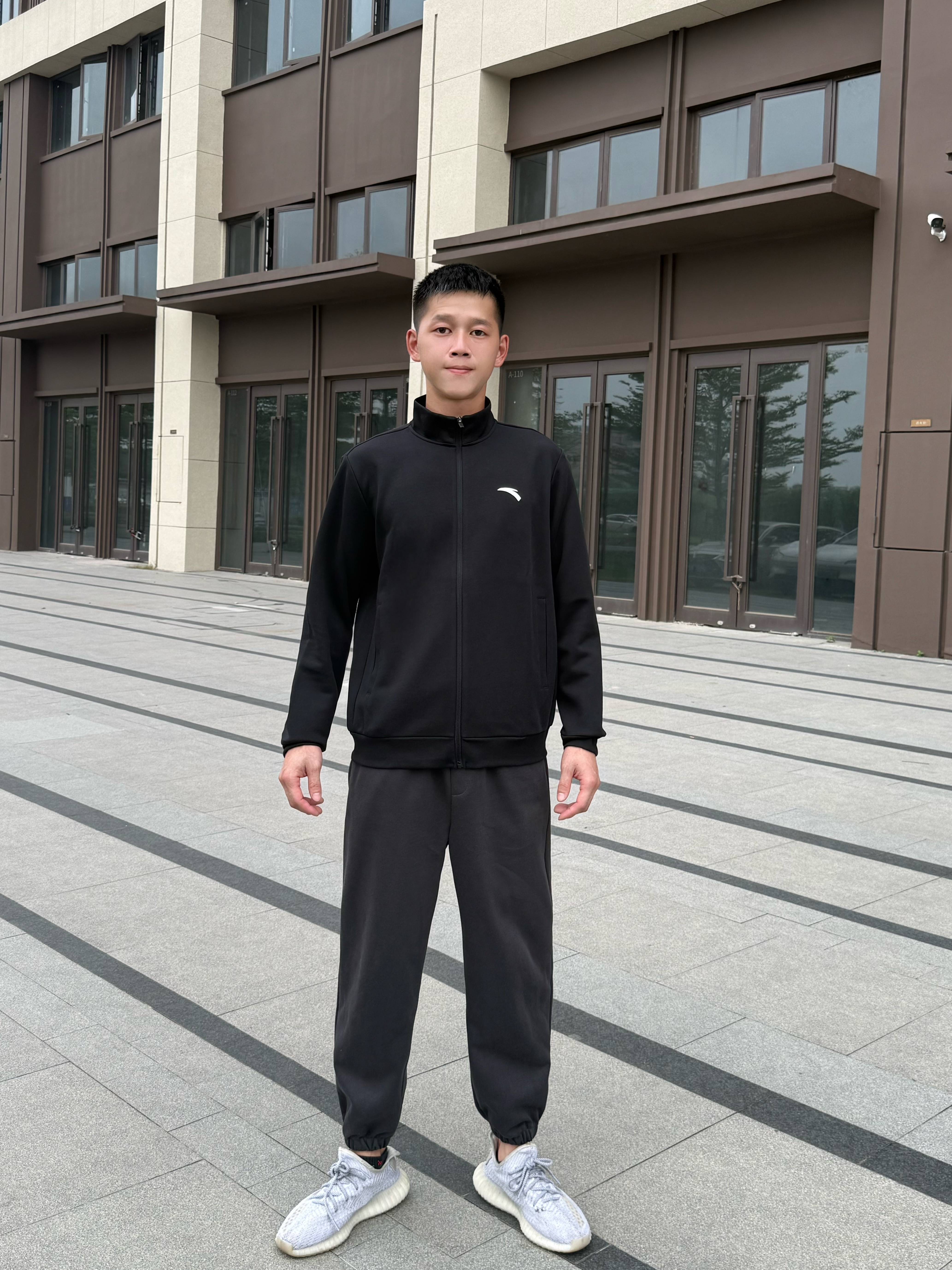 安踏运动外套男秋冬季针织立领商务行政夹克男士休闲开衫卫衣男装上衣 【常规款】基础黑7707-1 L (175) 建议120-140斤 实拍图
