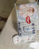 好奇（Huggies）金装小黑洞拉拉裤婴儿成长裤超薄透气宝宝尿不湿包装随机京东快递 拉拉裤L124片(9-14kg) 实拍图