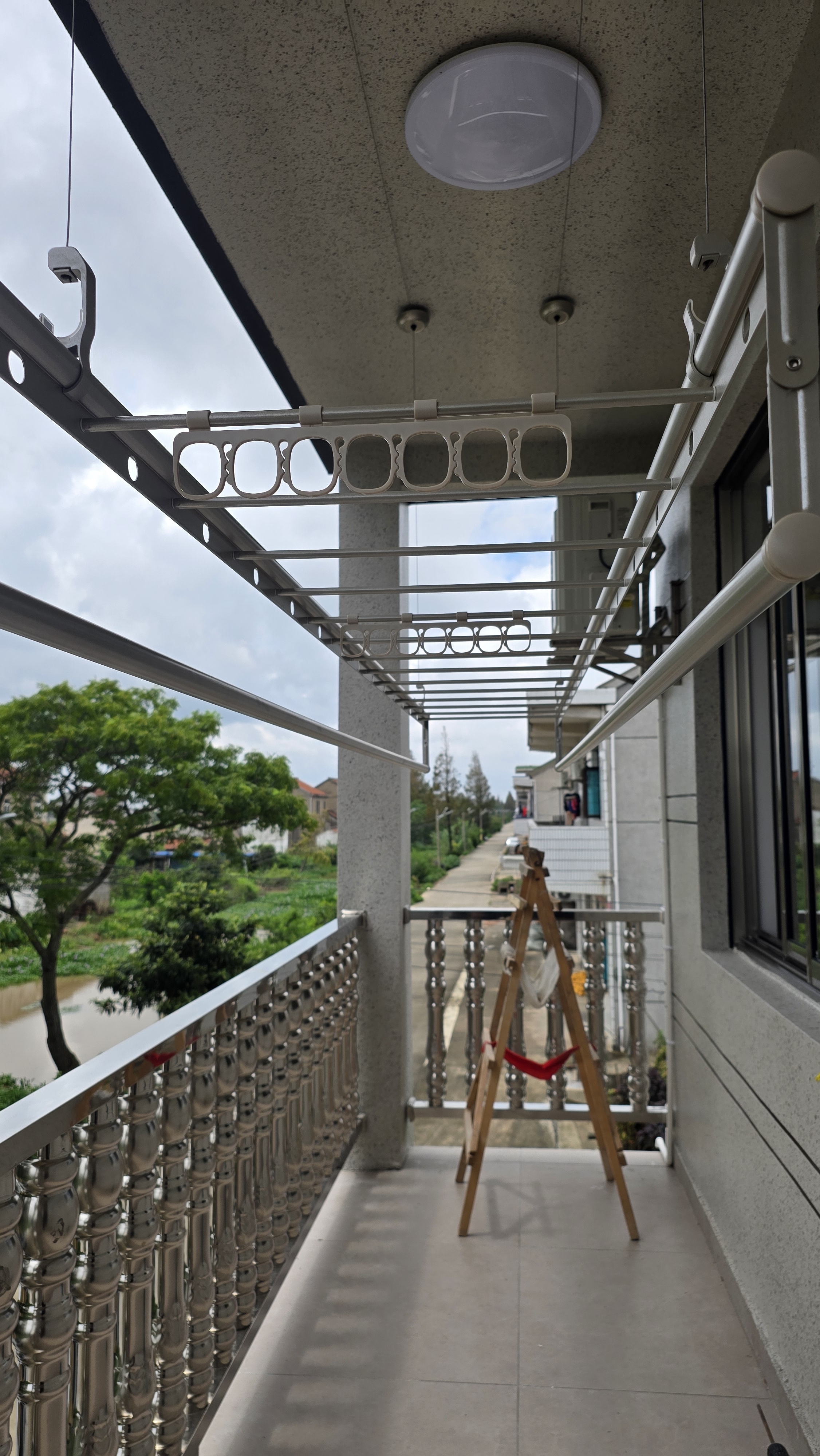 好太太（Hotata）手摇晾衣架阳台升降室外室内晒衣服架手摇式四杆晾衣杆挂衣架 D-1113：2.8米小金杆四杆+12衣架 实拍图