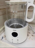 海尔恒温电热水壶1.5L 速热烧水壶煮茶壶冲泡奶粉调奶器 保温除氯不锈钢加热盘电热水壶H207白色 实拍图