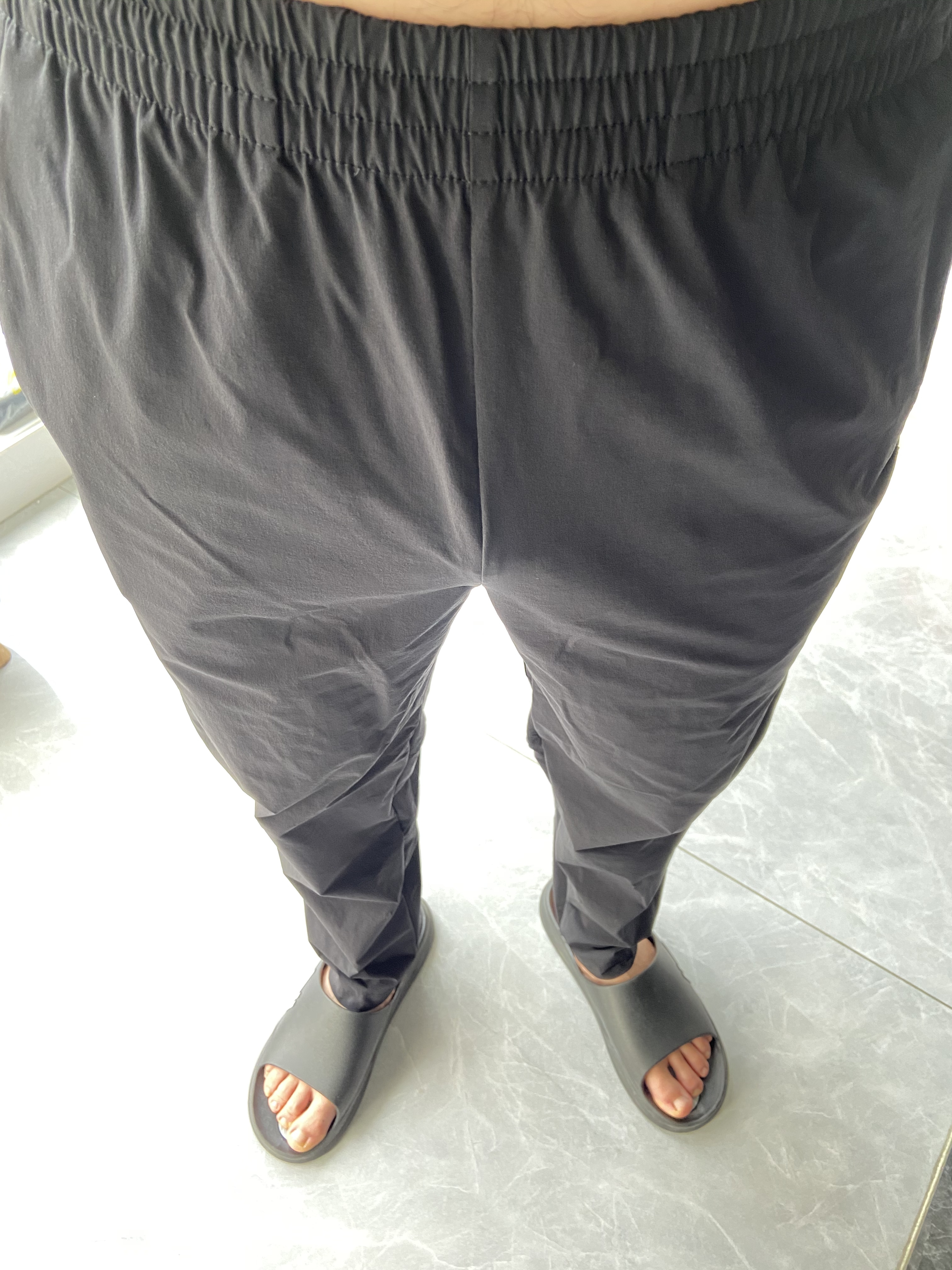 安踏（ANTA）XUT型动裤丨抗皱运动裤男秋季直筒休闲裤长裤子七夕情人节礼物 【休闲风+冰肤科技+高弹力】基础黑-3 抗UPF100+ XL (180) 建议拍大一码 实拍图