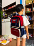 Kocotreekk树书包小学生减负超轻男孩女生1年级背包大容量儿童书包红M 实拍图