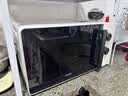 海尔（Haier）白巧不锈钢微波炉 0涂层360°转盘加热 旋转操作易洁耐用内胆 家用小型 老人适用 HW-M2003JW 实拍图