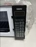 格兰仕（Galanz）微波炉烤箱一体机光波20L家用700W节能平板易清洁智能菜单多功能小型烧烤解冻预约 2026新款 DG 全新机器 实拍图