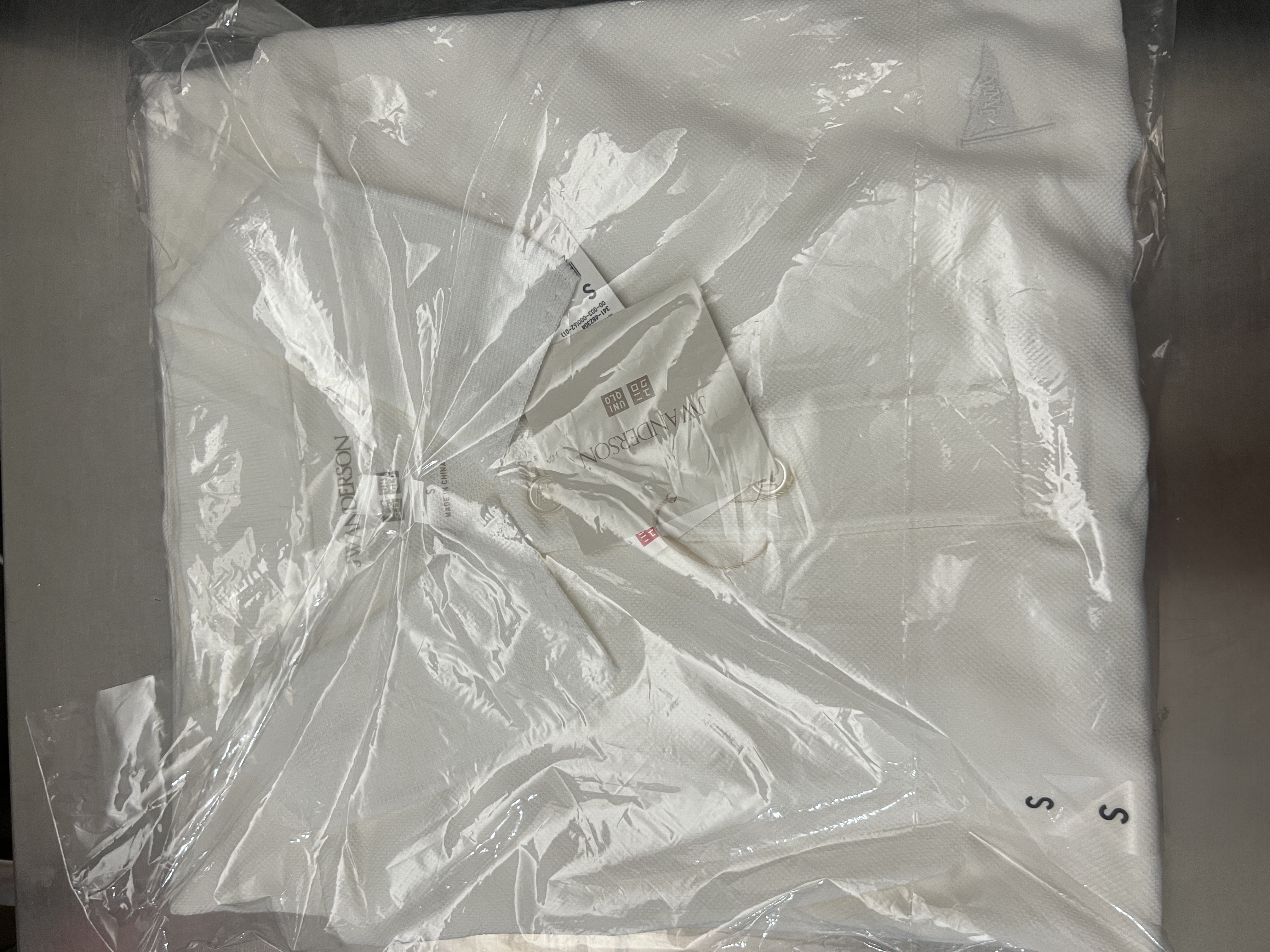 优衣库快干POLO衫/短袖男装女装合作款/T恤482304 00 白色 S 实拍图