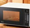 美的（Midea）家用微波炉20L大容量平板易清洁内胆【26年新款升级】 智能菜单高效速热 一键解冻 宝宝菜单 M22J 实拍图