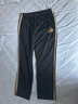 阿迪达斯（adidas）长裤男女春季宽松透气直筒裤跑步运动防风休闲裤  黑金 2XL 实拍图