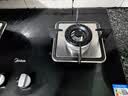 美的（Midea）燃气灶液化气 双灶具 4.8kW家用猛火灶台嵌两用 钢玻面板 可调底盘 二级能效 Q217B-M 实拍图