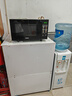 格兰仕（Galanz）变频微波炉烤箱一体机光波炉900瓦大功率速热家用23L大容量平板易清洁省电一级能效智能菜单烧烤 2026新升级彩膜BM1(S2) 实拍图